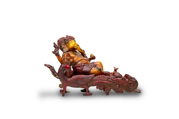 Solid Bronze Ganesha Resting on Peacock-Shaped Cot