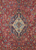 ORIENTAL RUG IN RED AND BLUE WITH MEDALLION