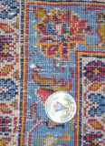 ORIENTAL RUG IN RED AND BLUE WITH MEDALLION